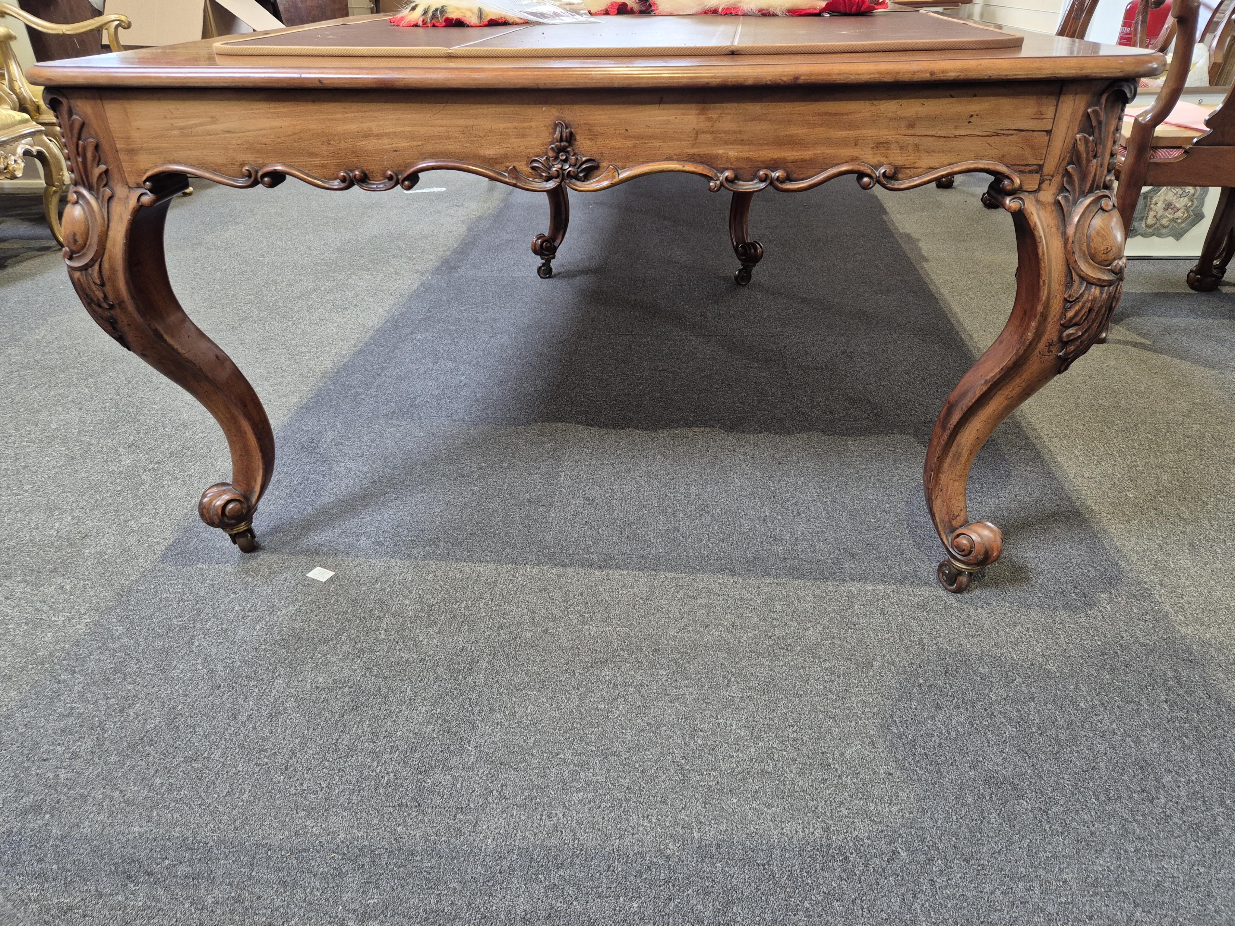 An unusually large William IV mahogany extending dining table